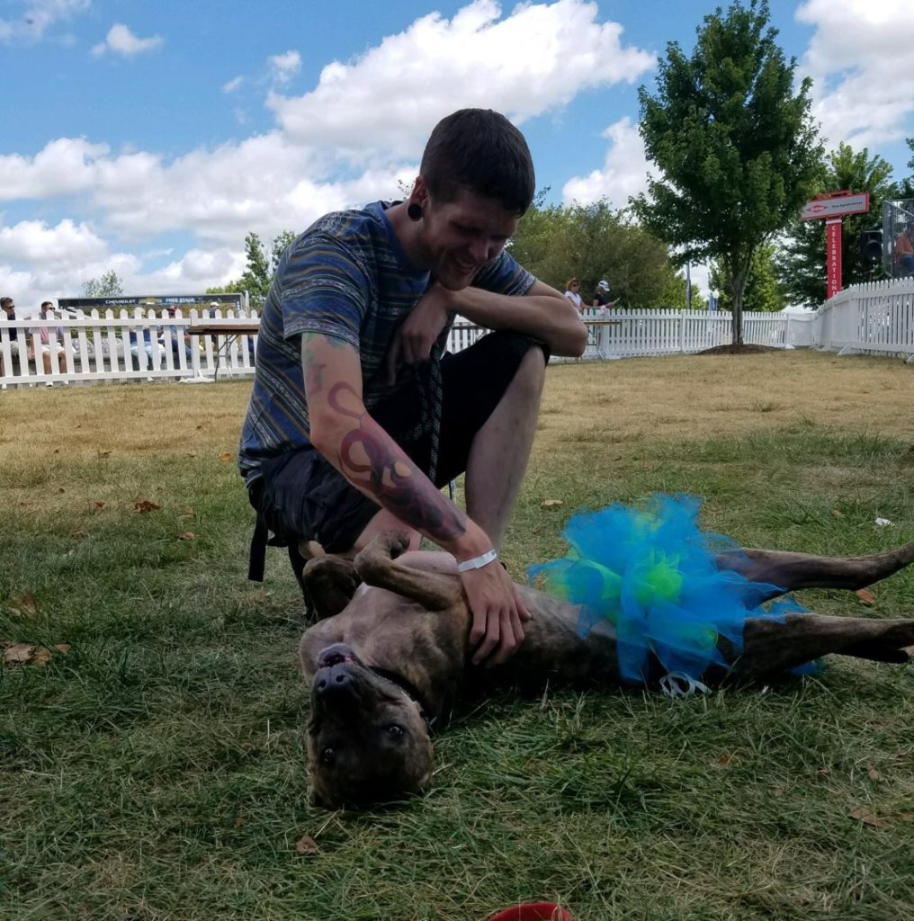 Jarod with a shelter dog he worked with on an outing.